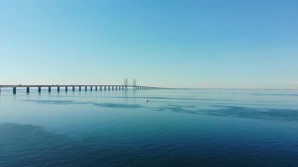 Nice aerial view of the Øresundsbron, drone flying upwards and forward