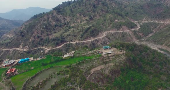 A beautiful hill top with houses. River and mountains and village with beautiful view.