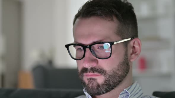 Close Up of Young Man Using Smartphone