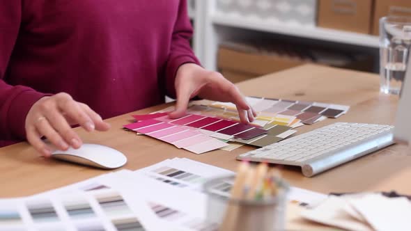 Designer Chooses Best Color Samples for the Client