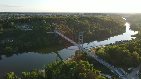 Aerial Shot The City Zhytomyr. Pedestrian Suspended Bridge Through The R. Teteriv. Ukraine