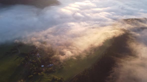 The Fog is Spreading in the Spring Landscape in the Glow of the Rising Sun in the Spring Nature