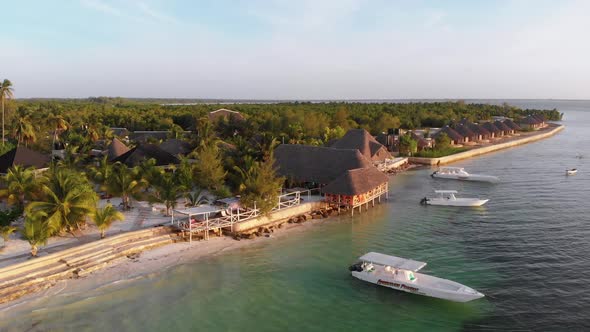 Paradise Beach Resort with Palm Trees and Hotels By Ocean Zanzibar Aerial View