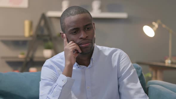 Portrait of Pensive African Man Thinking