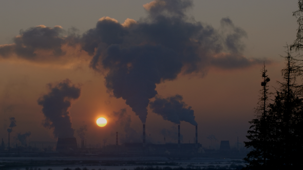 Sunset and the Smoking Thermoelectric Power Plant