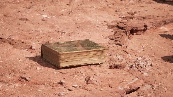 Old Book in Red Rock Desert alt
