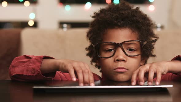 Kid at Keyboard Expressing Happiness.