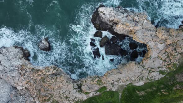 Aerial View of Sea Waves and Fantastic Cliffs Rocky Coast