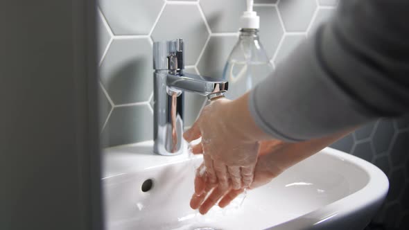 Close Up of Woman Washing Hands with Water