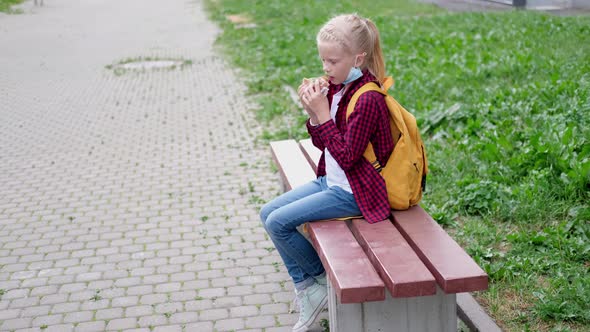 Back to School Girl Wearing Mask and Backpacks Protect and Safety From Coronavirus