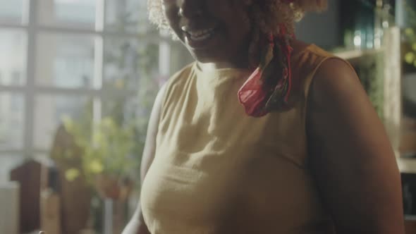 Woman Preparing Bell Peppers and Talking on Camera