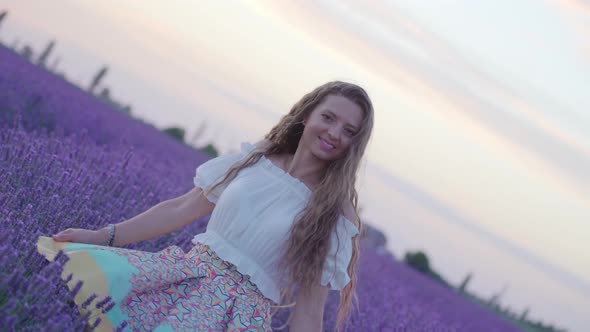 Happy Girl Moves Lavender Field