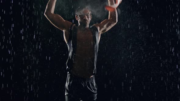 Victorious Man In The Rain With American Flag