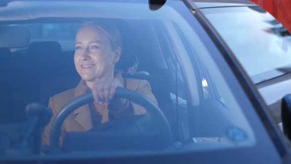 Joyful Mom Taking Girl Home After School By Car