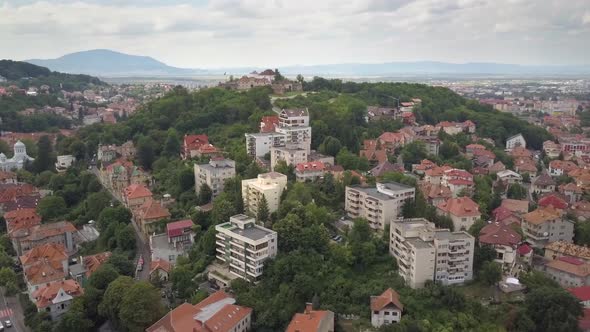 Aerial view of Brasov city, medieval town situated in Transylvania, Romania. Old architecture 