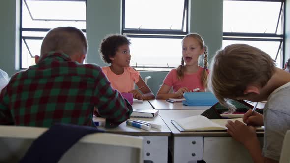 Group of kids studying in the class