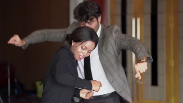 Men and Women Dance Happily at the Club