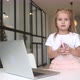 Little Kid Sit at Desk with Laptop and Mobile Phone - VideoHive Item for Sale