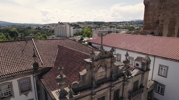 Main facade of the Misericordia Church against Castelo de Chaves, Portugal. Aerial shot