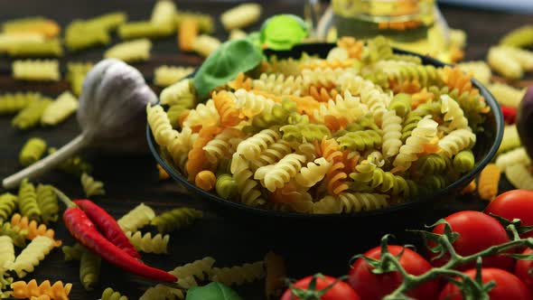 Bowl with Raw Macaroni of Different Color