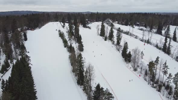 Aerial View of Downhill Skiing at Local Ski Resort. Ski Lift. Russia, Leningrdaskaya Oblast, Village
