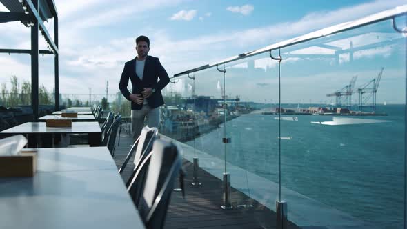 Handsome Man Walking Terrace at Sea View