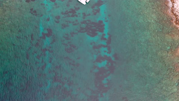 Aerial View of the Turquoise Water and the Yacht in the Adriatic Sea Croatia