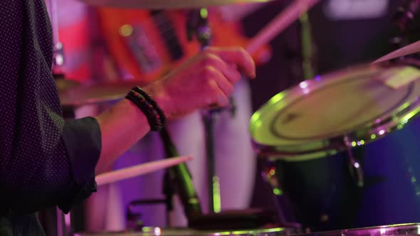 Close Up of Drummer Hands with Drumsticks