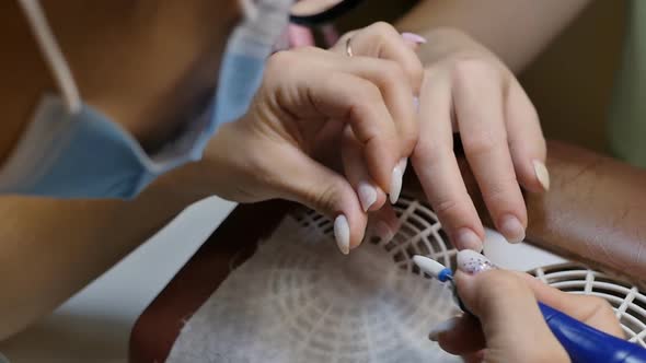 Removal of Old Gel Polish Shellac From Nails with a Manicure Machine