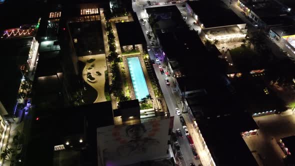 Night video rooftop pool in the city