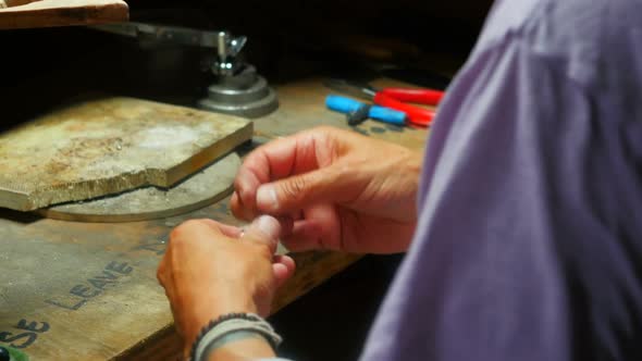 Craftswoman working in workshop