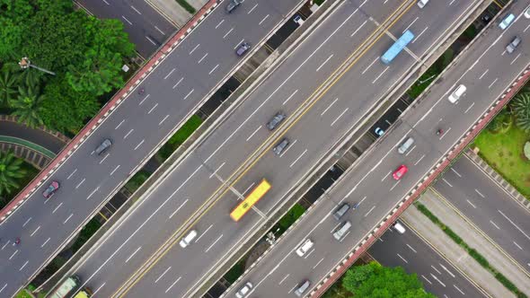 Zoom In Rotating Drone Shot of Busy Highway Intersection - Jakarta, Indonesia