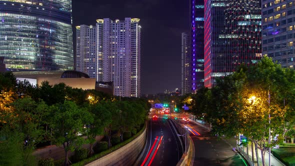 Shanghai Heavy Street Traffic Timelapse at Night Zoom Out