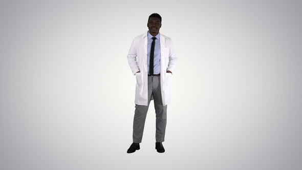 Male African Doctor Standing With Hands In His Pockets