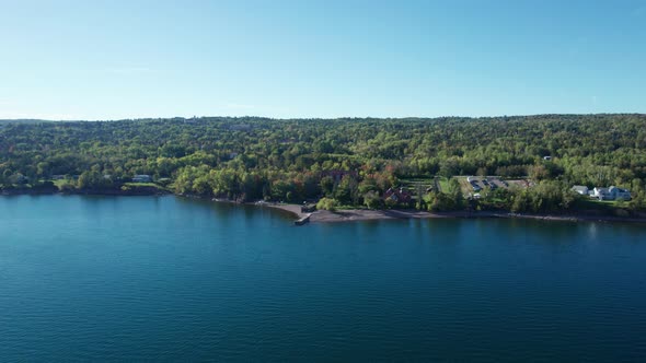 Drone aerial view of lake superior shoreline in the early fall
