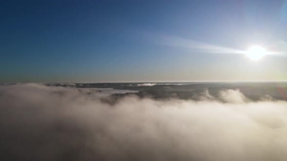Sunrise Above the Clouds in the Midwest, USA - Aerial Establishing with Copy Space in Sky