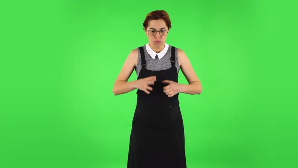 Funny Girl in Round Glasses Annoyed Gesturing in Stress Expressing Irritation. Green Screen