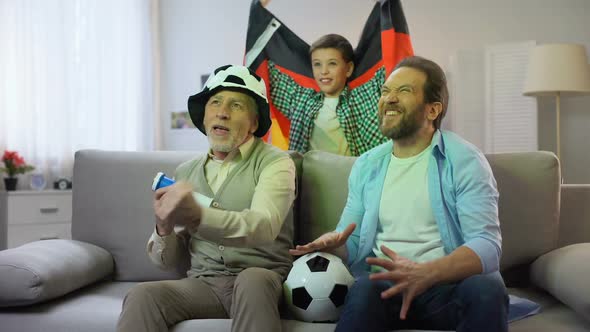 Happy German Fans Cheering for Football Team, Friendly Family Having Good Time