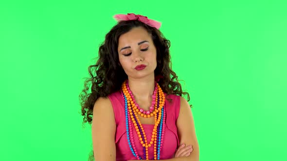 Young Woman Stands Waiting with Boredom on Green Screen