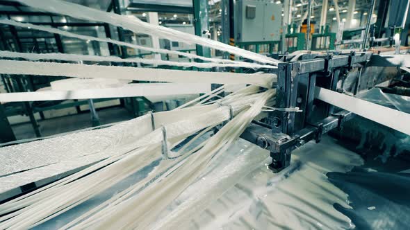 Fiberglass is Getting Strained By a Factory Machine