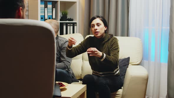 Zoom in Shot of Angry Young Wife at Couple Therapy