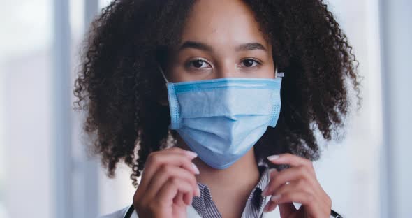 Portrait Happy Smiling Afro Female Scientist Taking Off Protective Medical Face Mask After