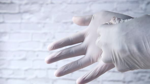 Man Doctor Wears Medical Gloves, Close Up