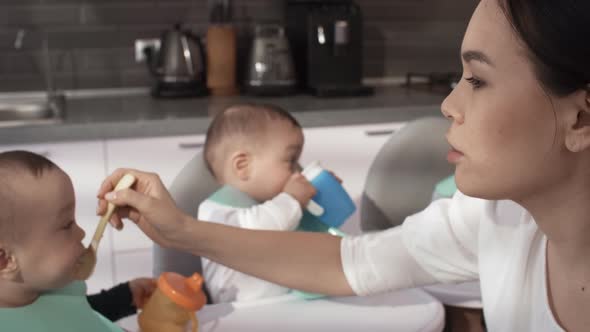 Filipino Mom Patiently Feeding her 1-Year-Old Triplets