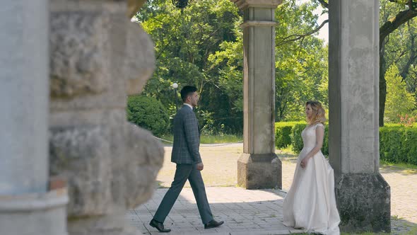 The Bride Approaches the Bride and Gives Her His Hands. The Happy Emotions of the Children Who Met