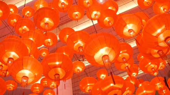 Traditional Red Chinese Paper Lanterns Hanging on the Ceiling in Shopping Mall