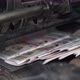 Printed Newspapers are Moved Along Conveyor - VideoHive Item for Sale