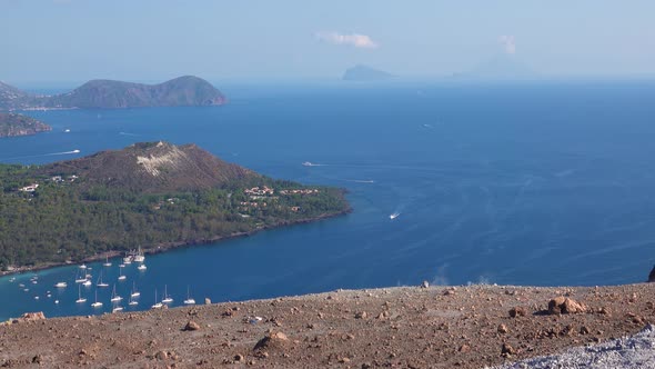 View From Vulcano Island on Lipari Islands in Mediterranean Sea. Buildings, Green Trees and Blue Sky