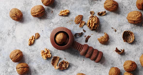 Wooden Cracker with Walnuts in Composition