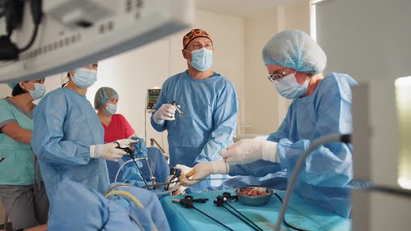 The Surgeon's Doing Laparoscopic Surgery in the Operating Room